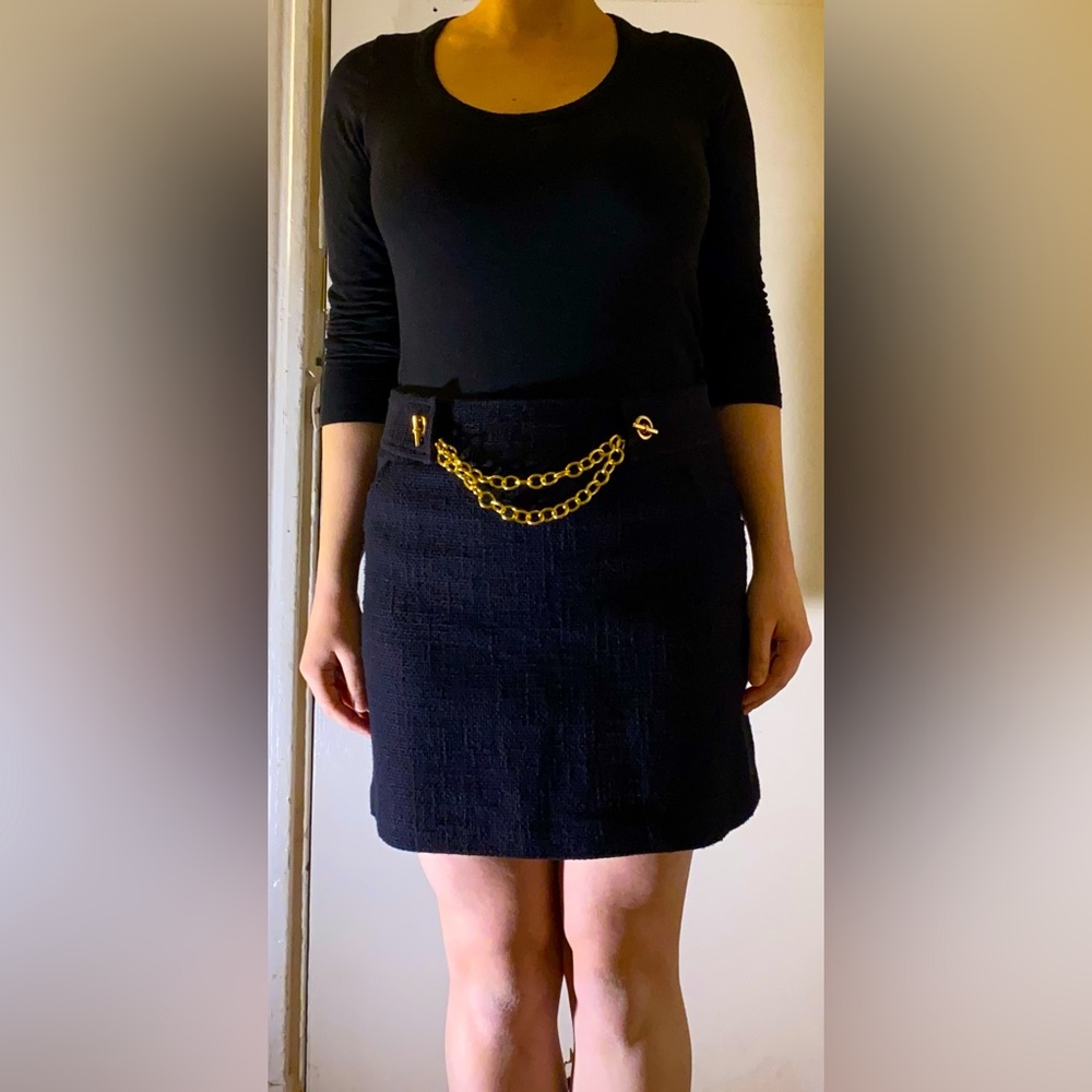 Mini skirt with gold chain and pockets